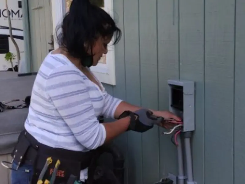 Licensed electrician wiring an exterior subpanel in Santa Paula